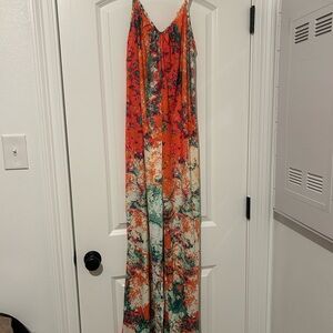 Red and Green Flare Jumpsuit with Elegant Drape